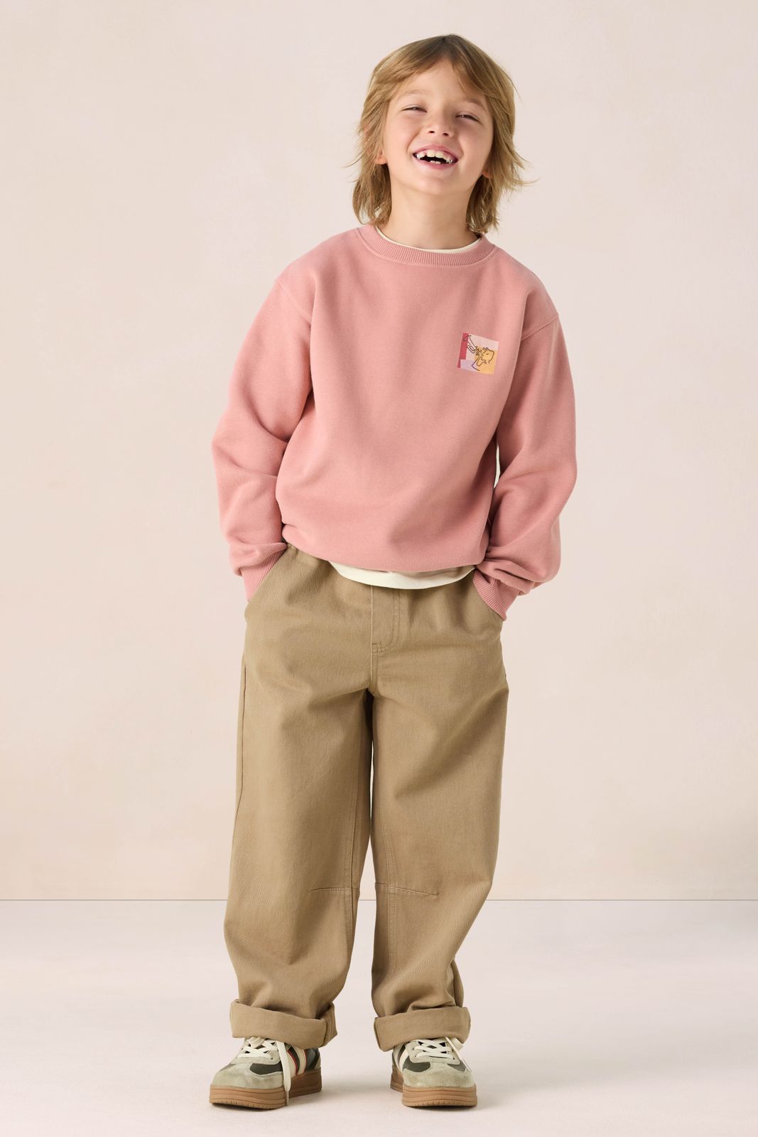 Roze sweater met artwork