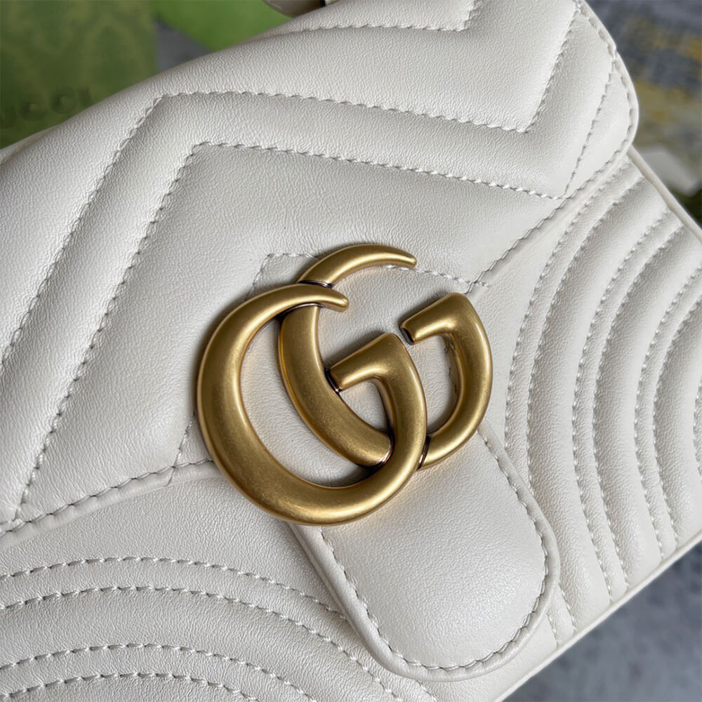 GG Marmont mini top handle bag - Top Club