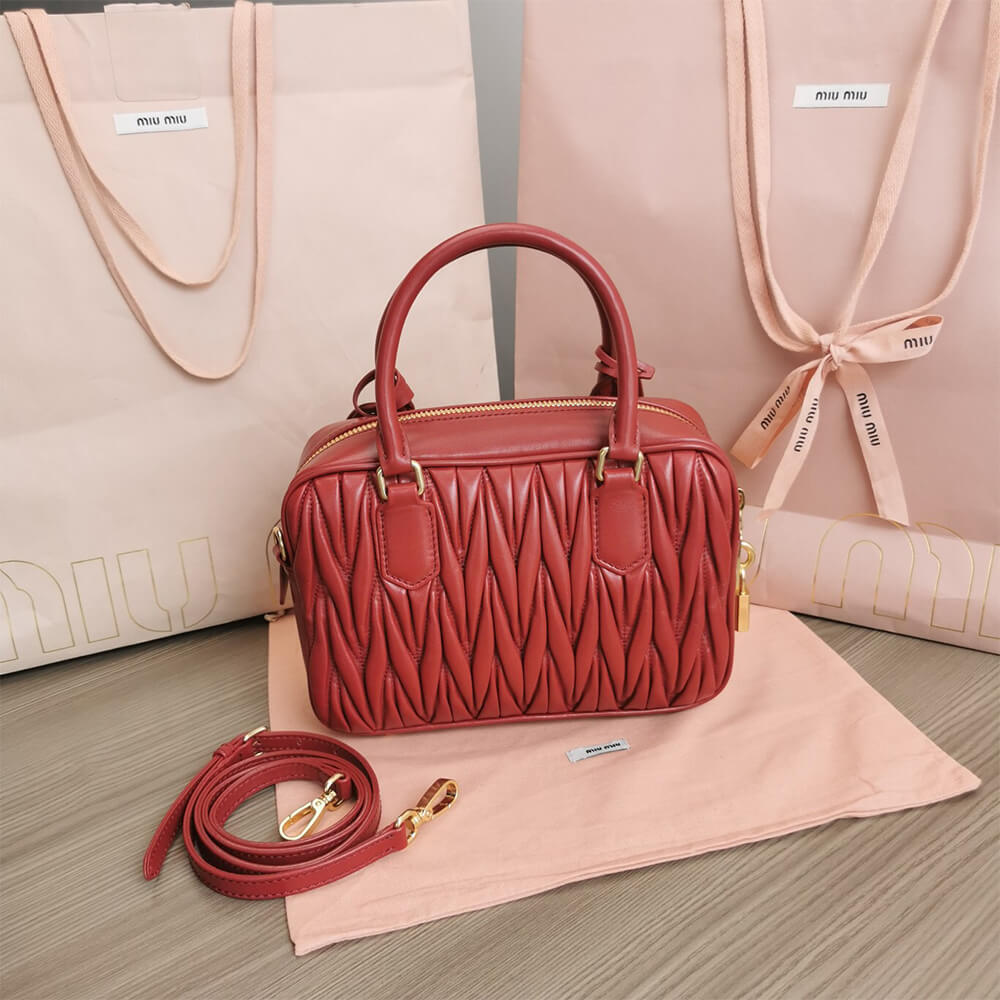 Matelasse nappa leather top-handle bag - Top Club