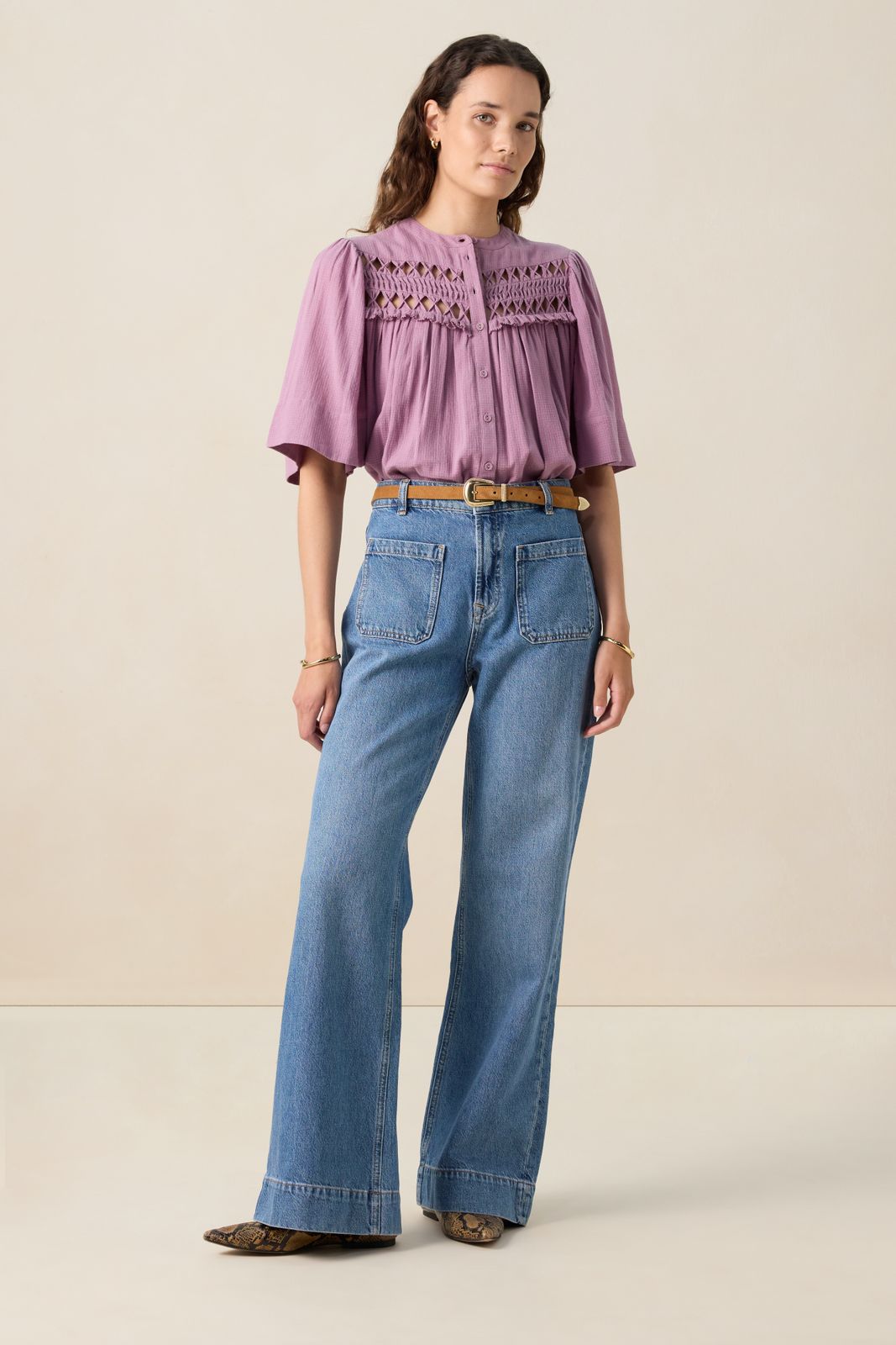 Paarse blouse met pofmouwen