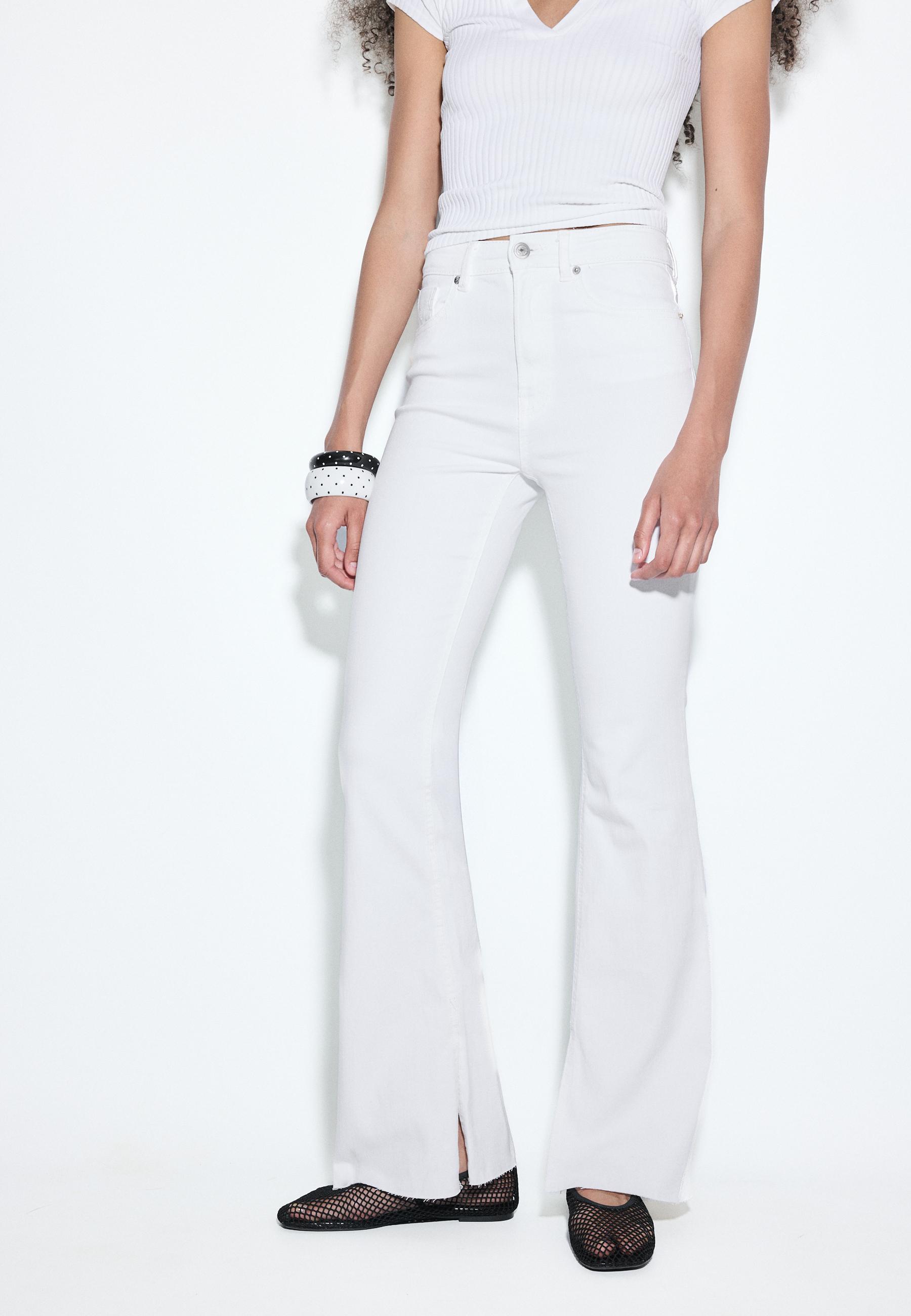 D74 FLARED JEANS WITH SLIT