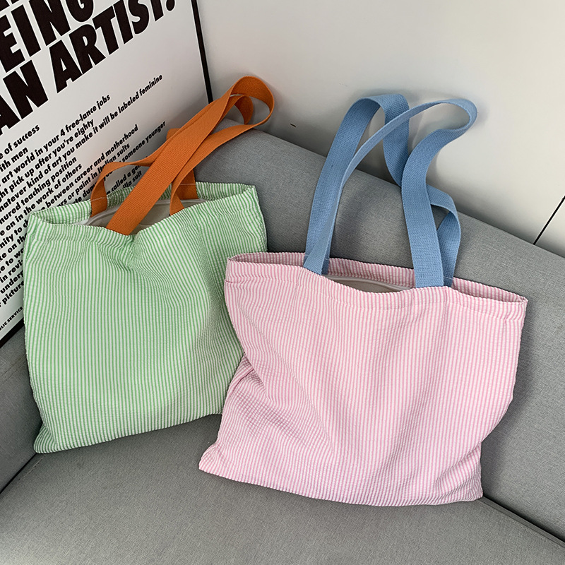 Striped bag with contrasting colors, fresh and simple canvas bag, large capacity, suitable for class and commuting, high aesthetic value, single shoulder tote bag