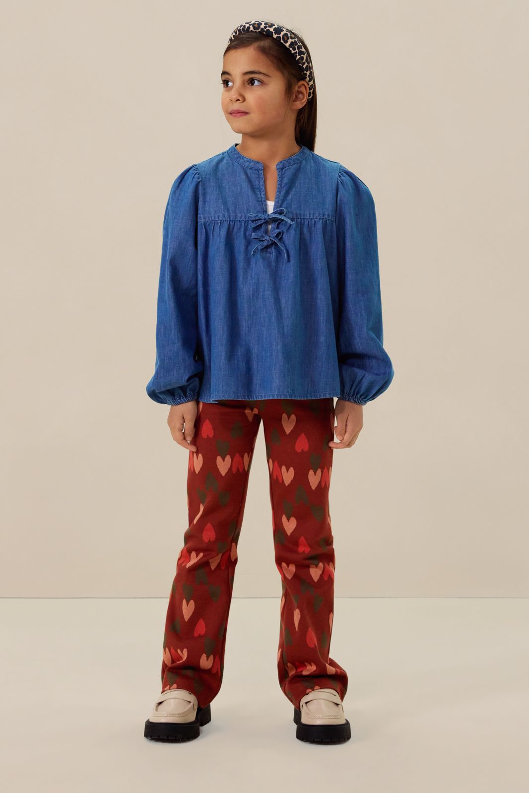 Bruine flared legging met hartjes print