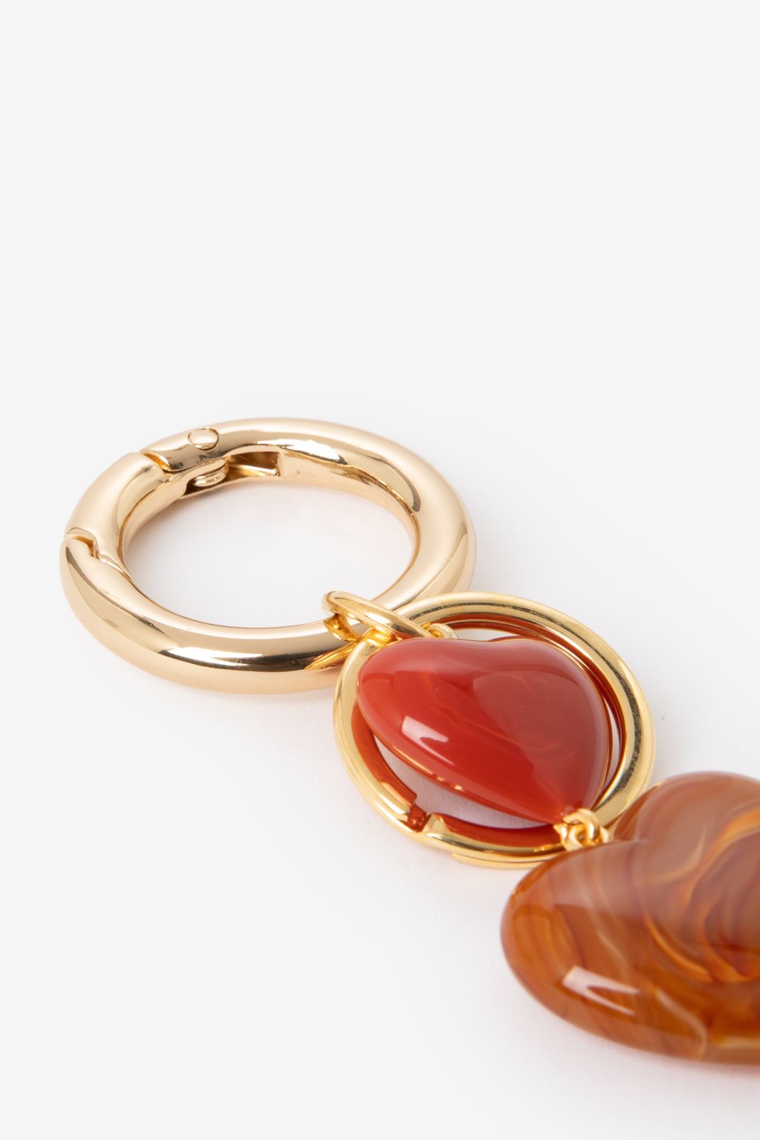 Roze resin bag charm met hartjes