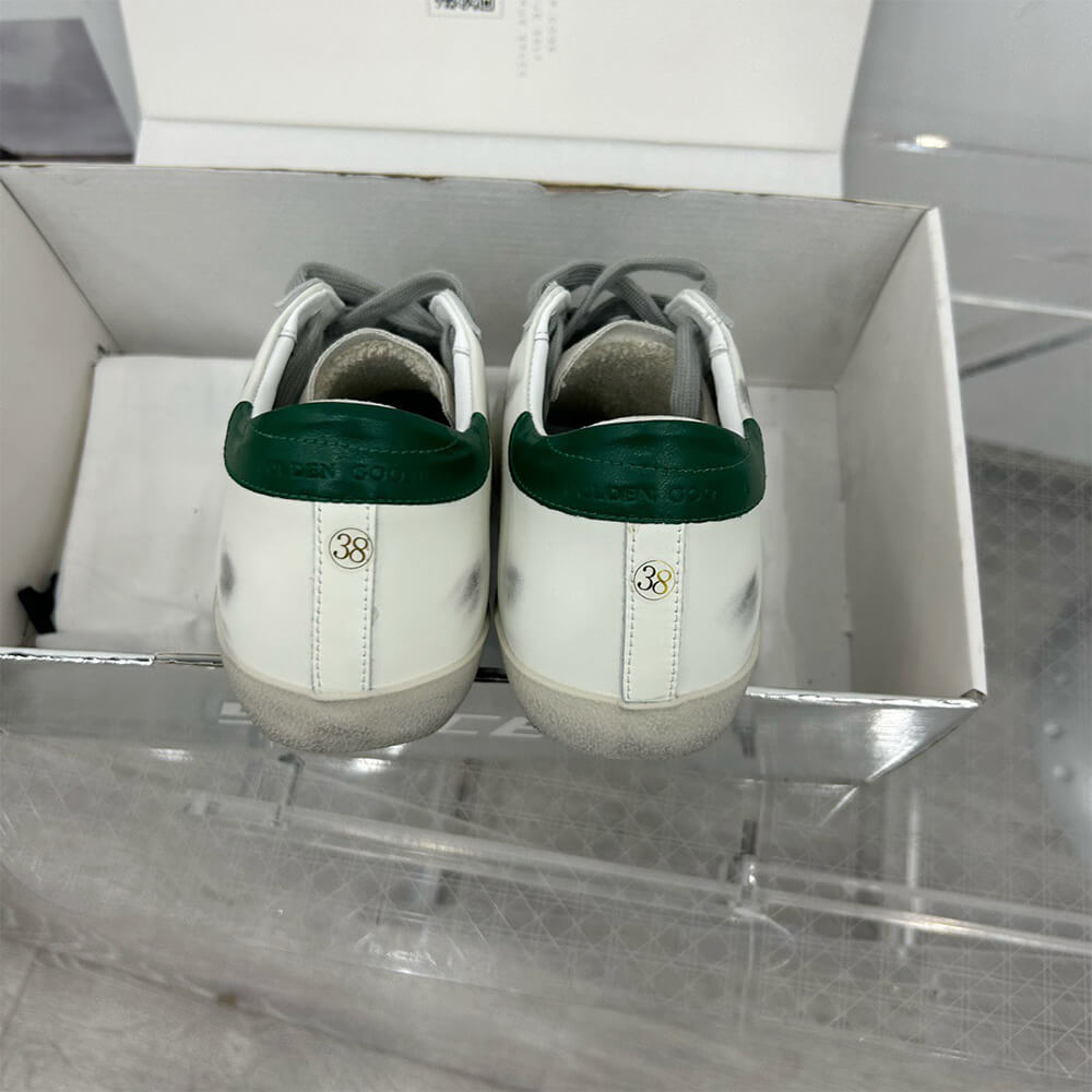 Golden Goose Sneakers - Top Club