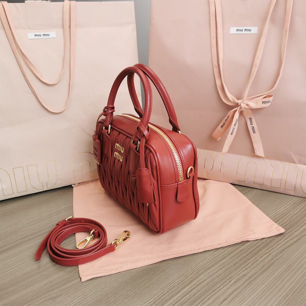 Matelasse nappa leather top-handle bag - Top Club