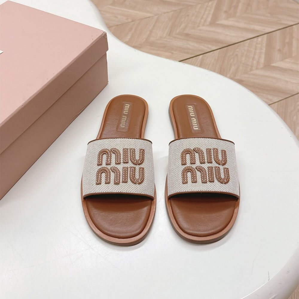 MiuMiu Canvas and leather slides - Top Club