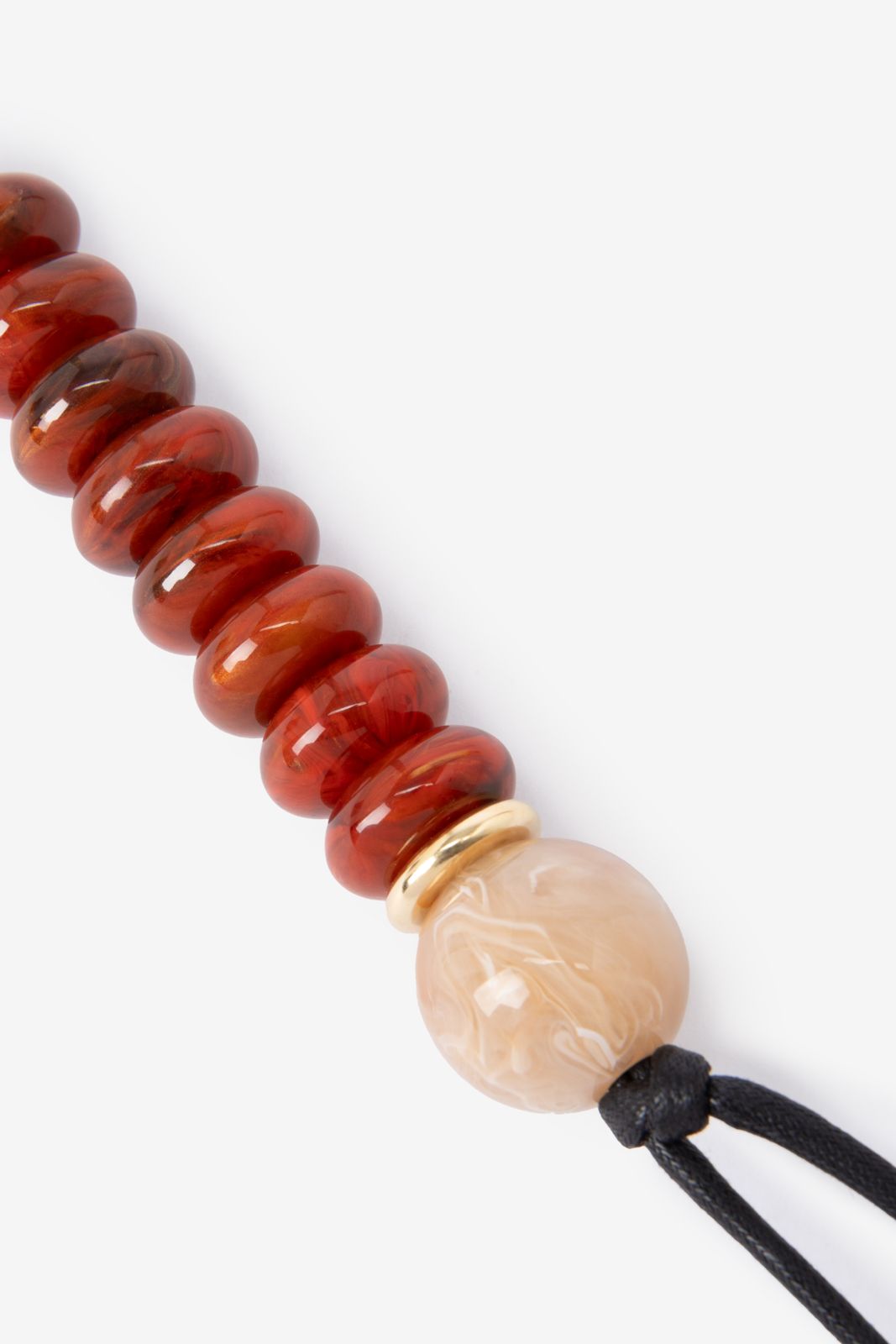 Bruine resin bag charm