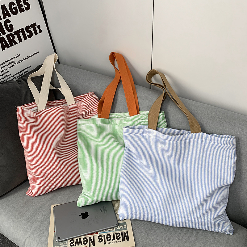 Striped bag with contrasting colors, fresh and simple canvas bag, large capacity, suitable for class and commuting, high aesthetic value, single shoulder tote bag