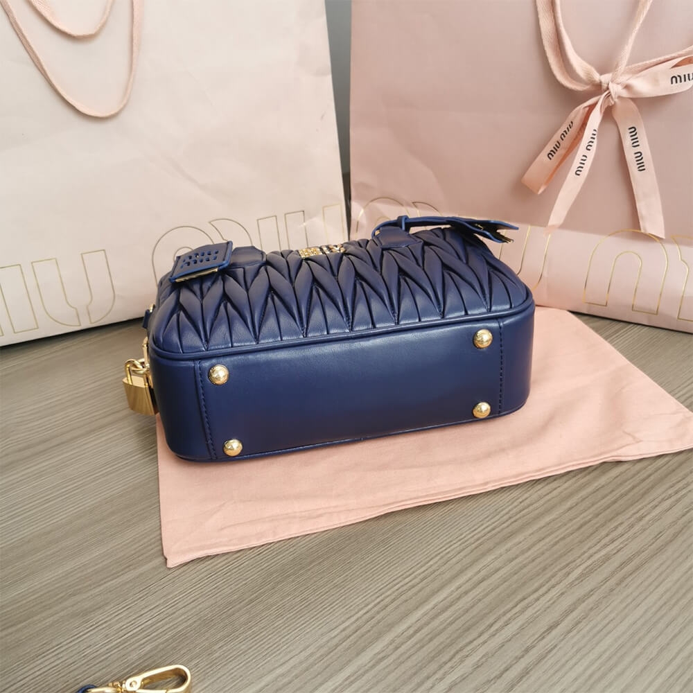 Matelasse nappa leather top-handle bag - Top Club
