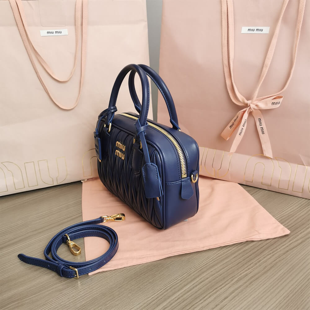 Matelasse nappa leather top-handle bag - Top Club