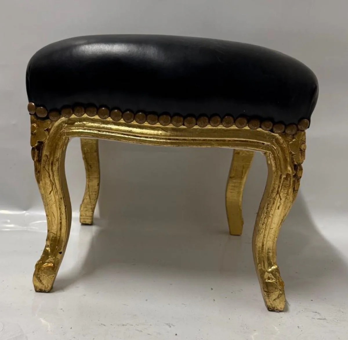 Baroque faux leather footstool black / antique gold H. 34 cm - baroque style stool