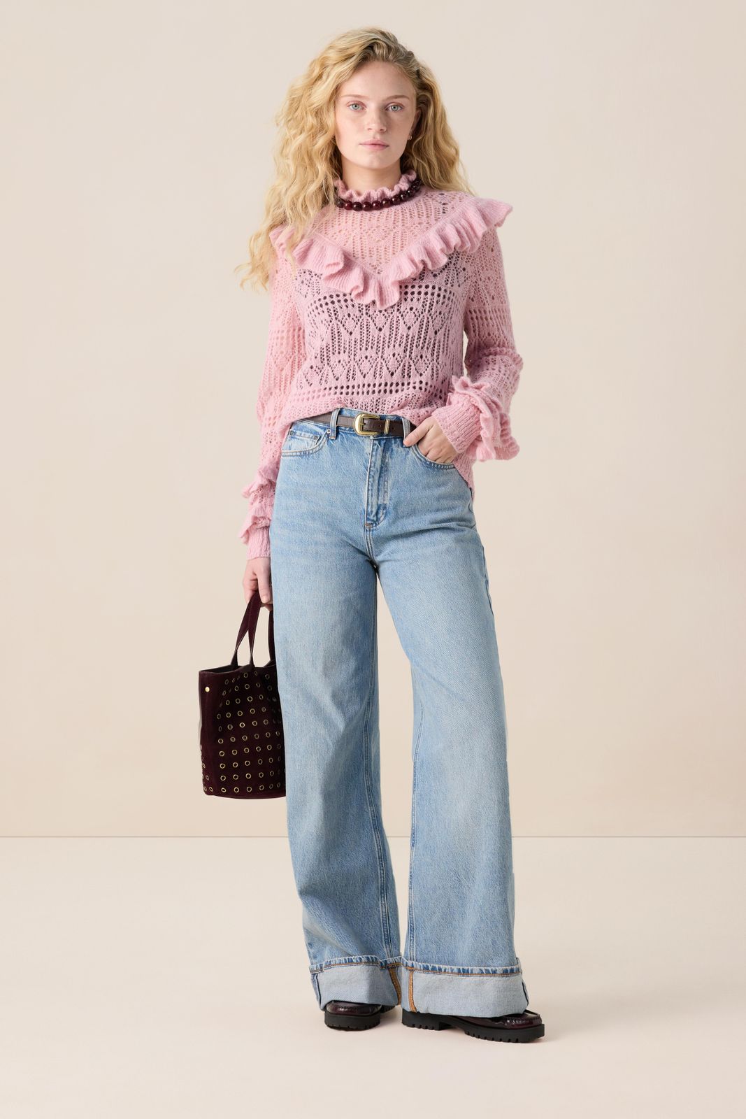 Roze ajour trui met ruffles