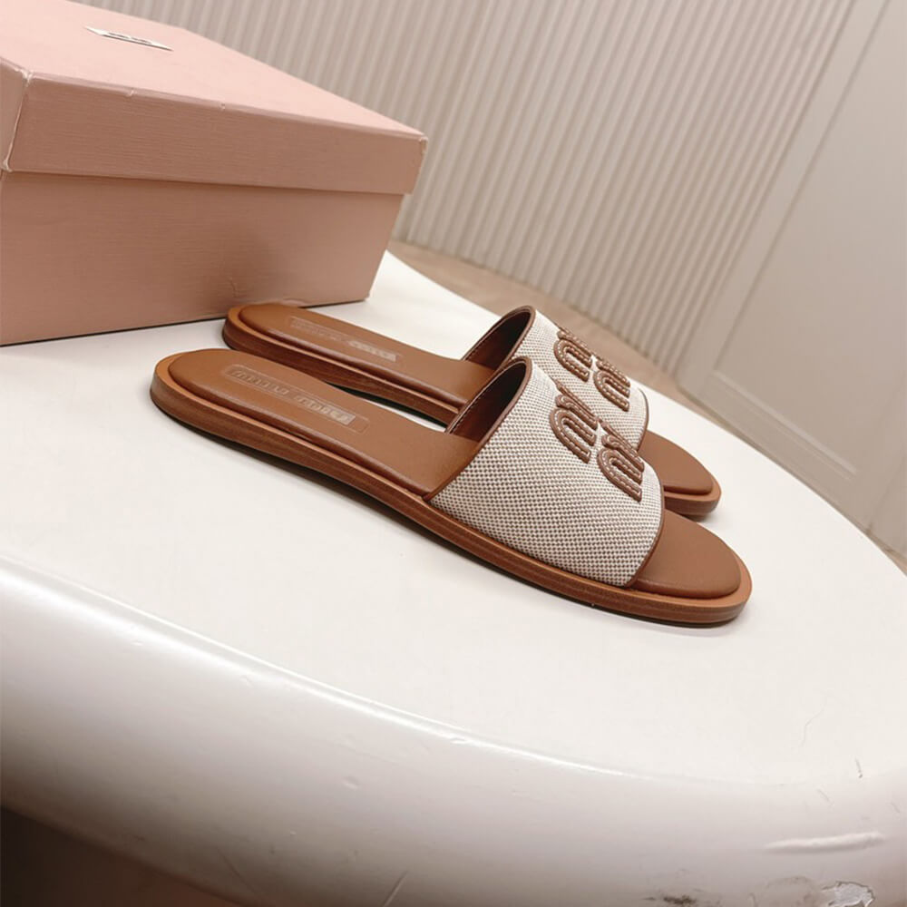 MiuMiu Canvas and leather slides - Top Club