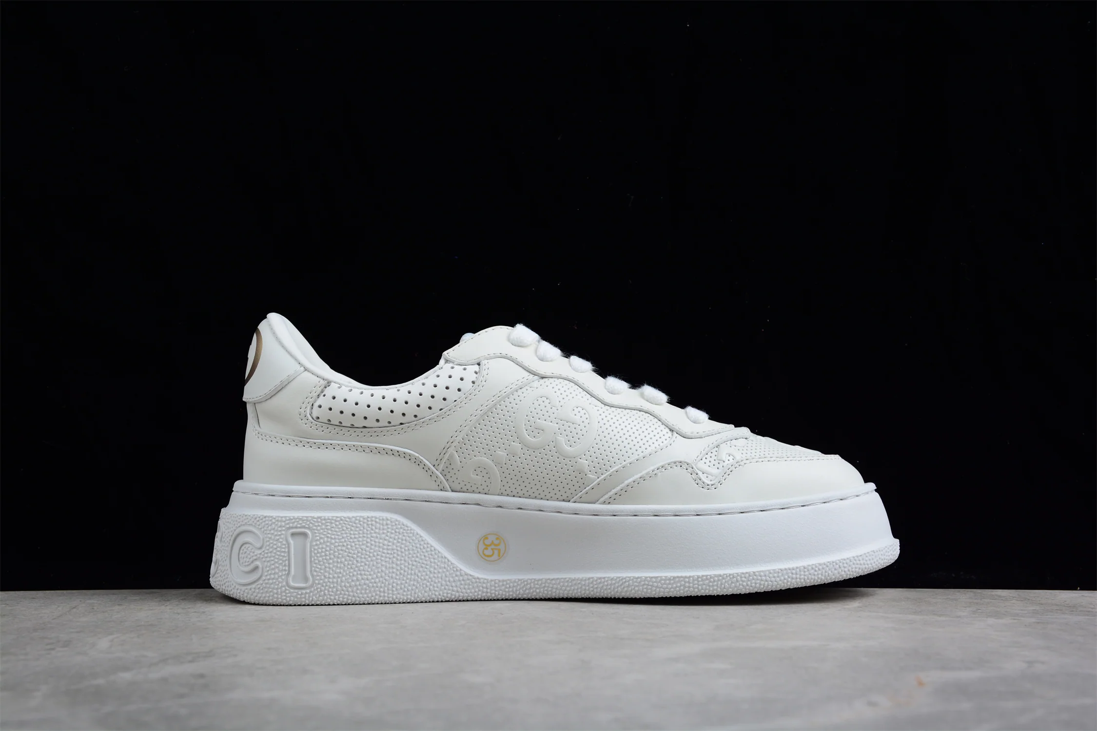 Gucci Embossed GG Logo Sneaker 