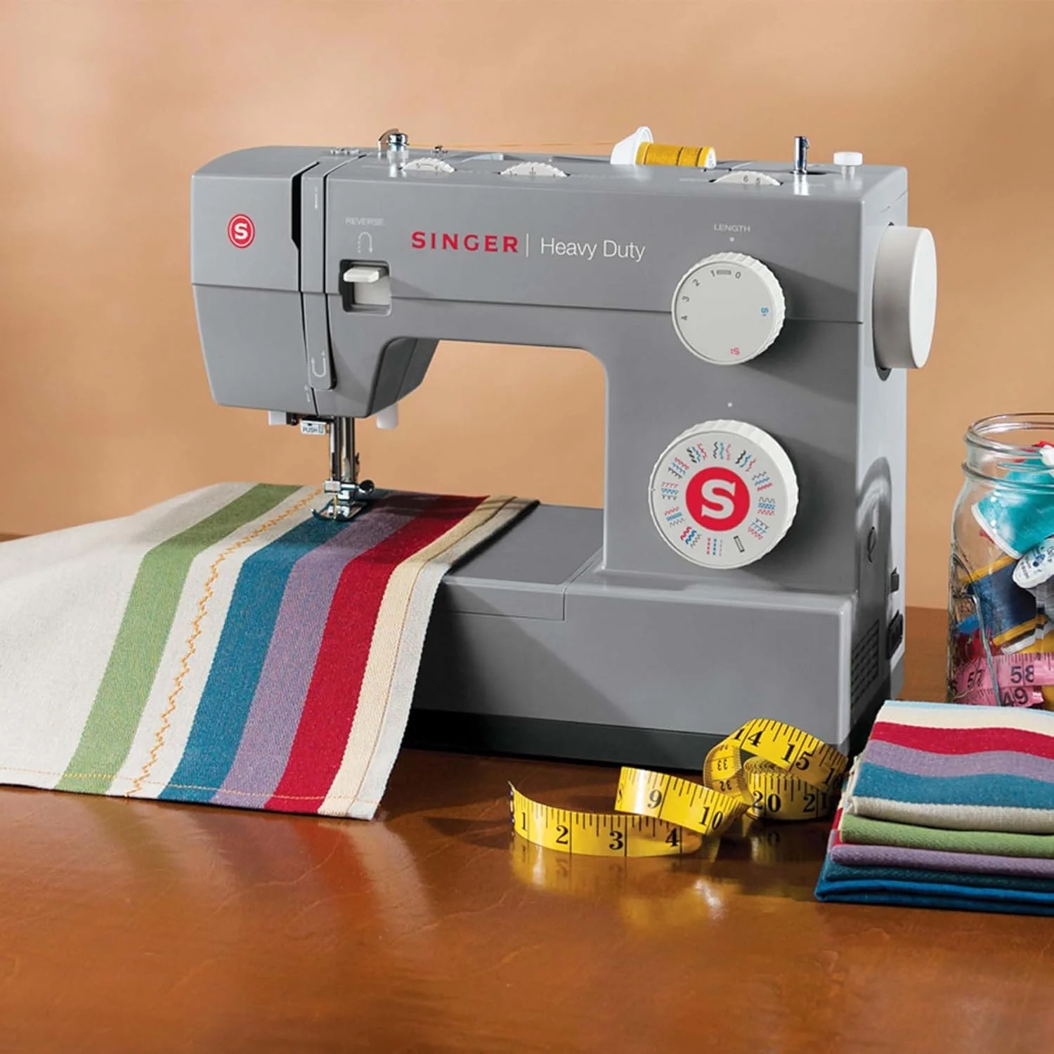 SINGER Heavy Duty 4423 High Speed Sewing Machine with Accessory Kit | Strong Motor With Enhanced Piercing Power, 97 Stitch Applications, Full Metal frame, 1-step Buttonhole & LED Light