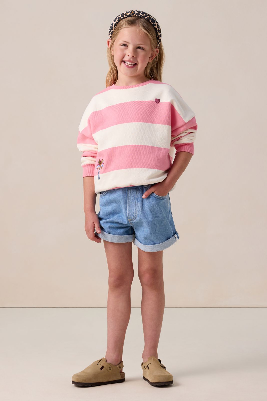 Lichtroze trui met strepen