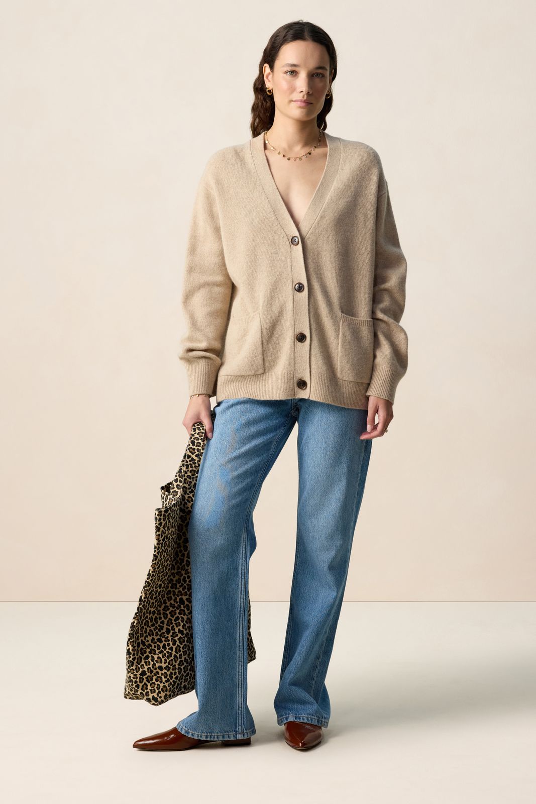 Beige vest met V-hals