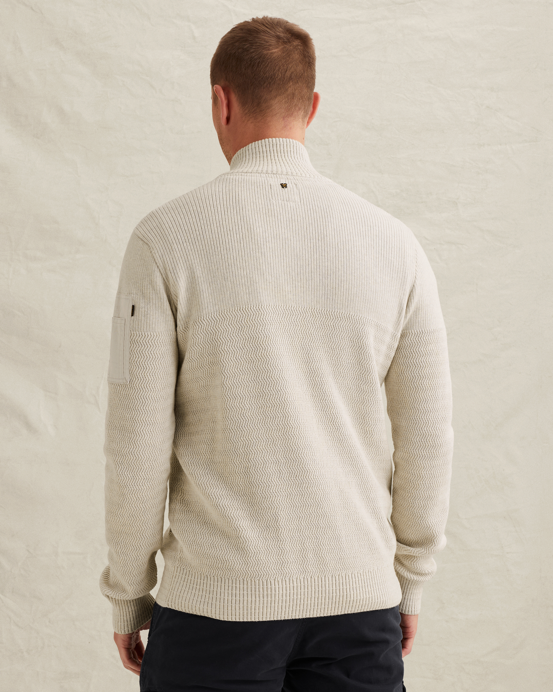 Cardigan with zipper closure and flight pocketx
