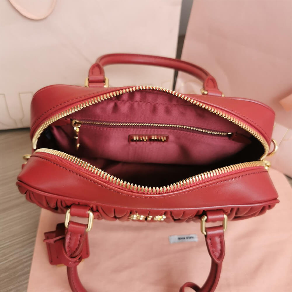 Matelasse nappa leather top-handle bag - Top Club