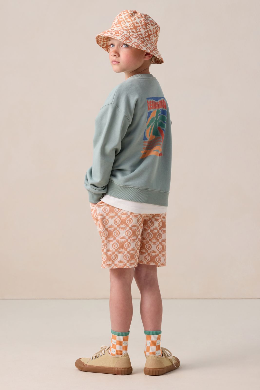 Oranje shorts met smiley print