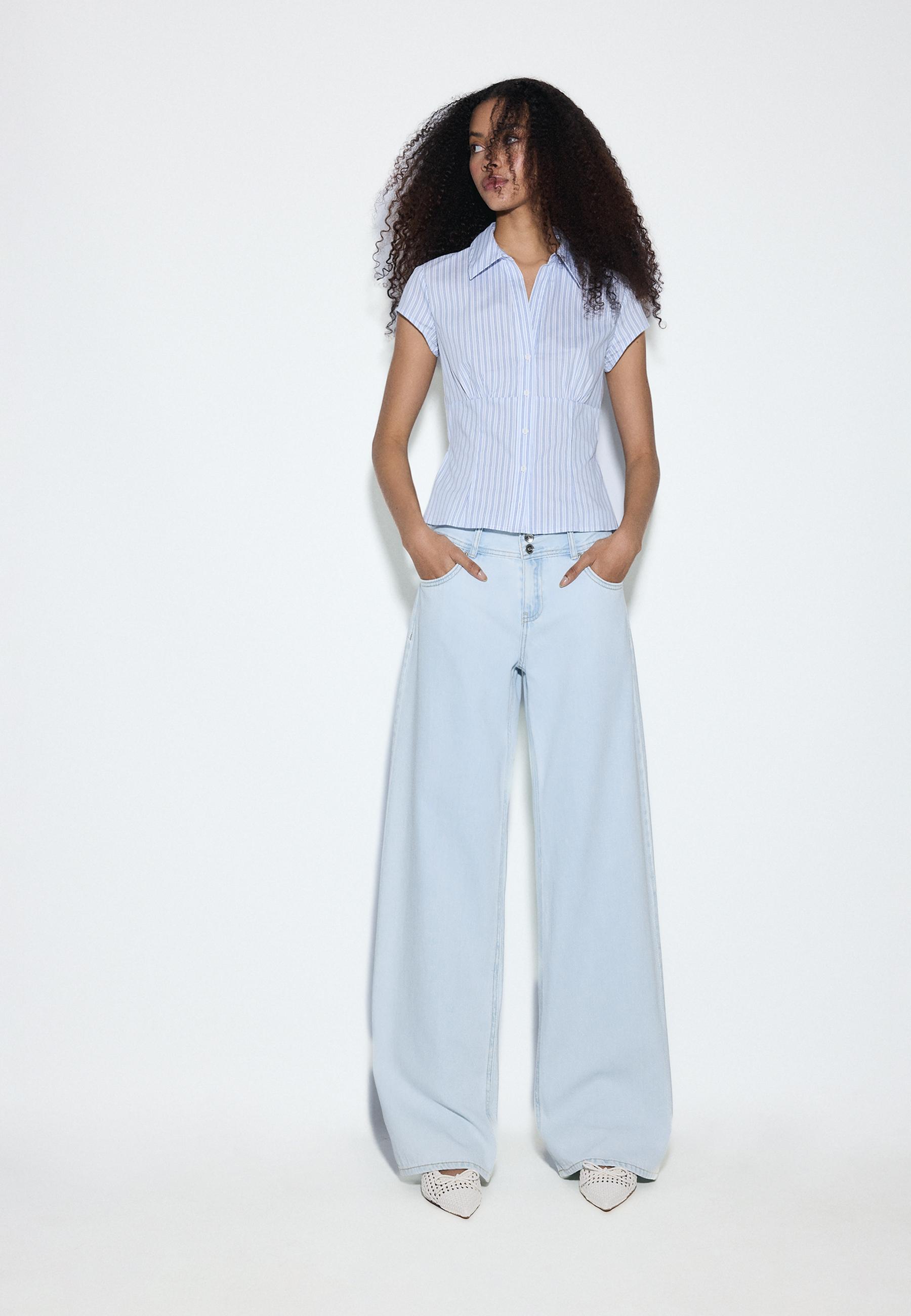 LOW-RISE DOUBLE-BUTTON JEANS