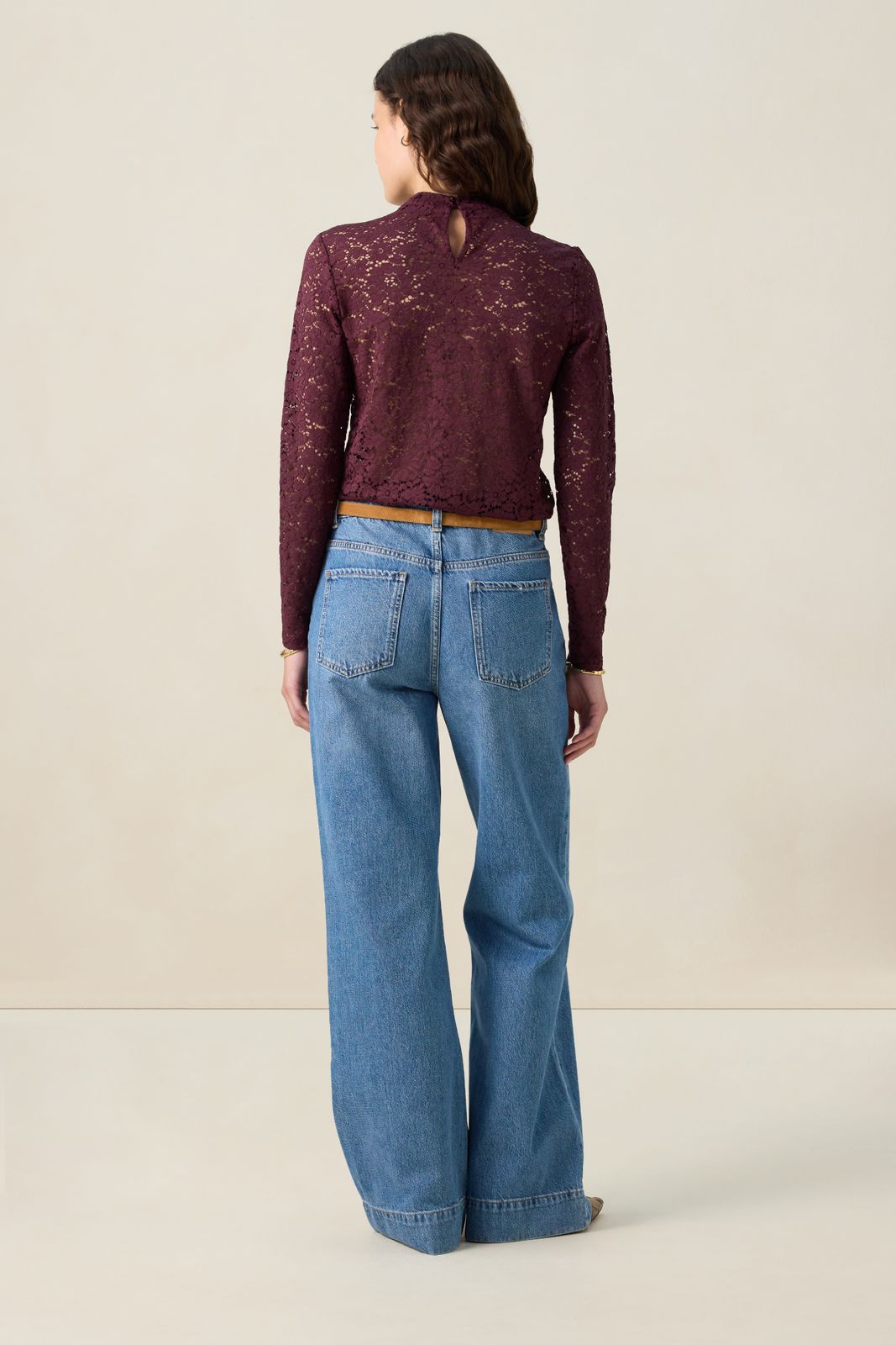 Blauwe high waist jeans met opgestikte zakken