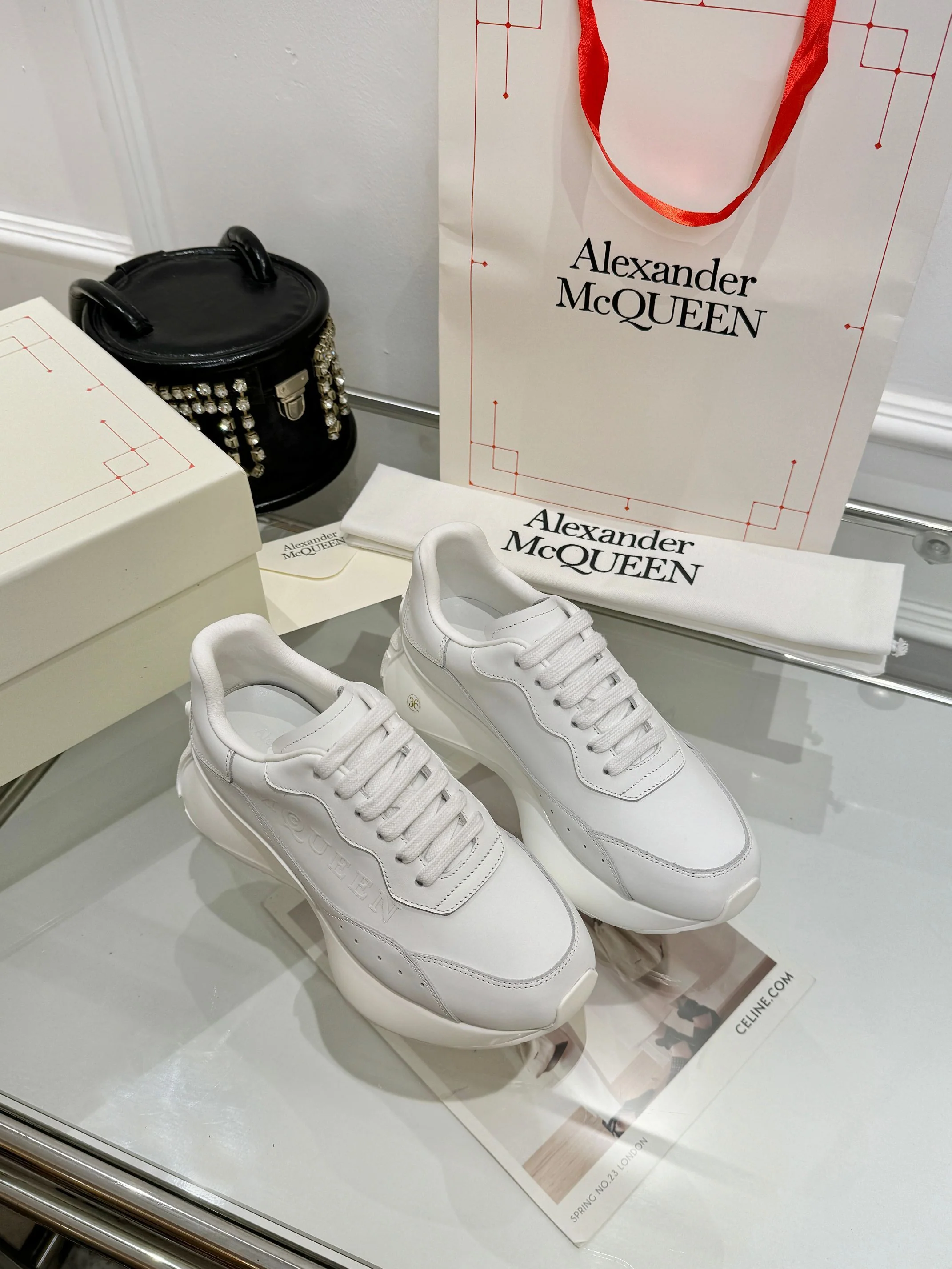 Alexander McQueen Unisex Oversized Sneakers With Metallic Heel Accents - Sneaker Replica Workshop