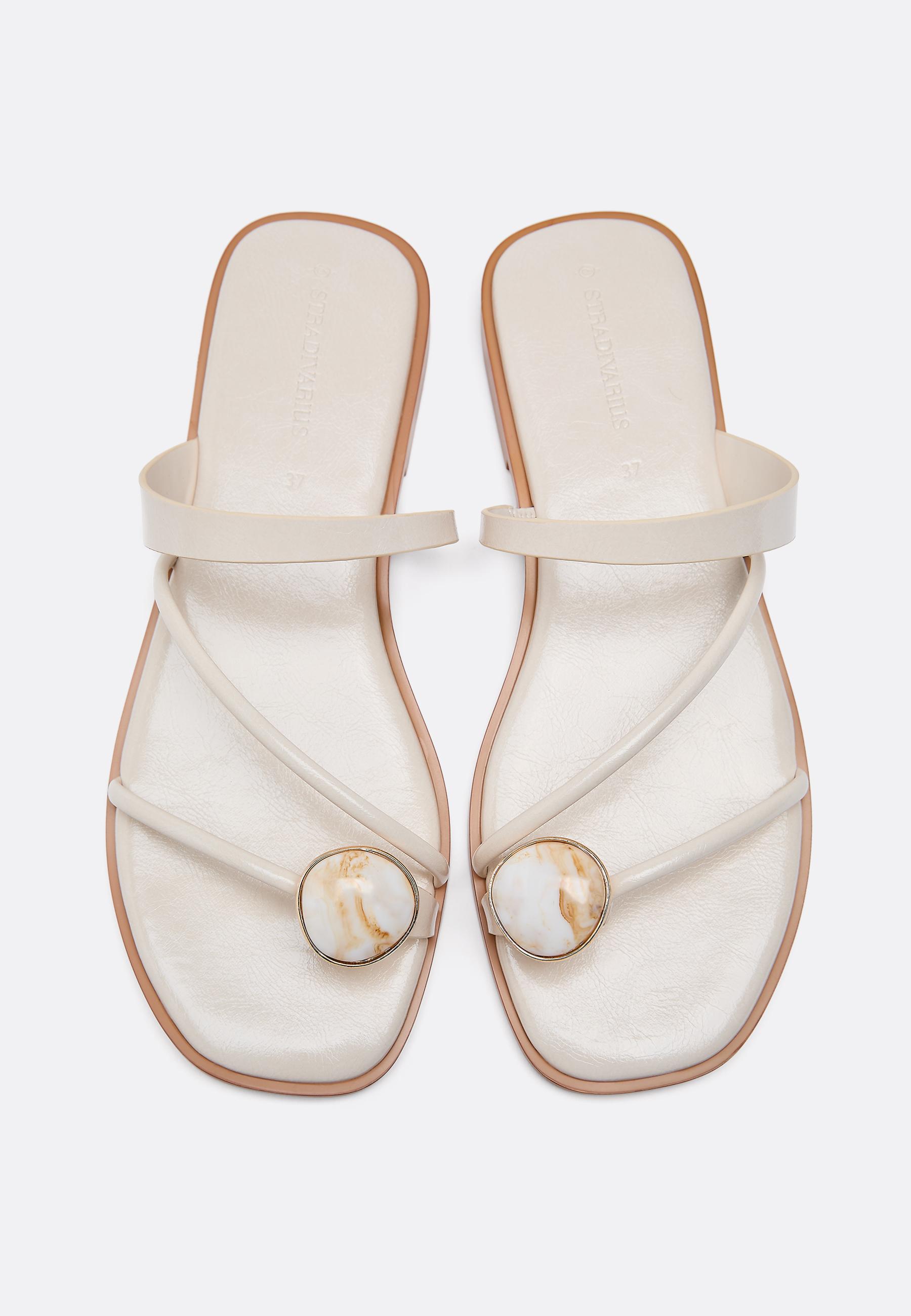 FLAT SANDALS WITH STONE DETAIL