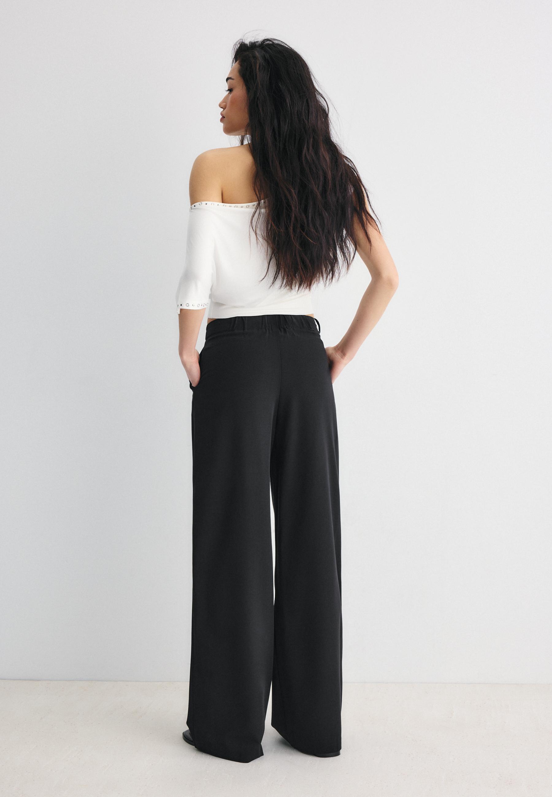 WIDE-LEG TROUSERS WITH BUCKLE DETAIL