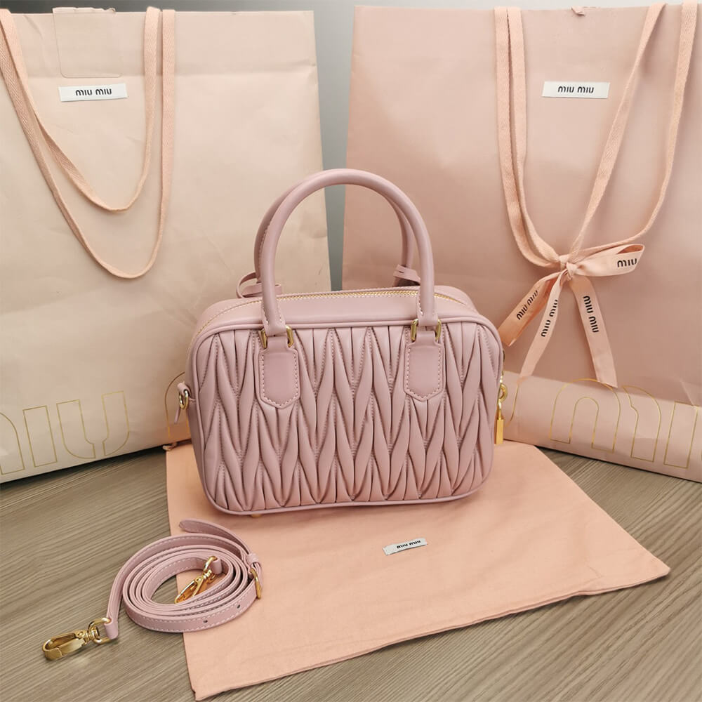 Matelasse nappa leather top-handle bag - Top Club