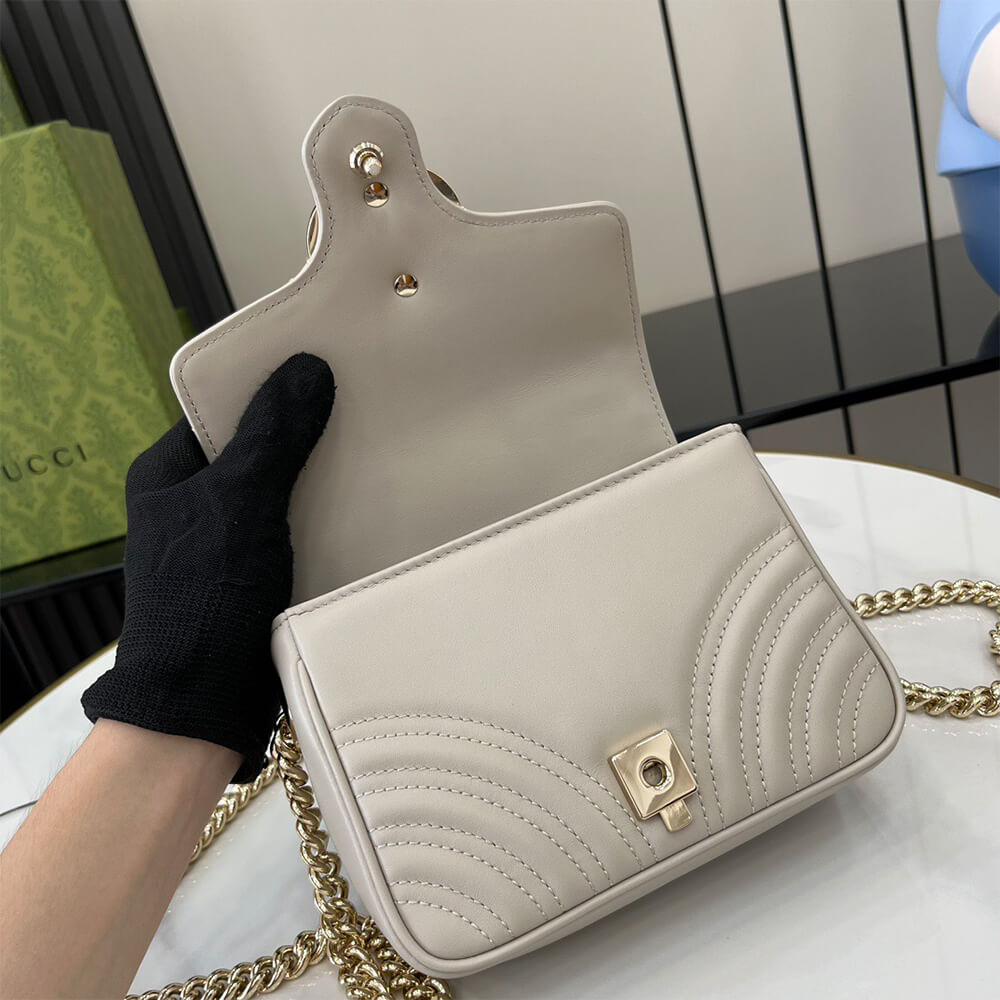 GG Marmont mini top handle bag - Top Club