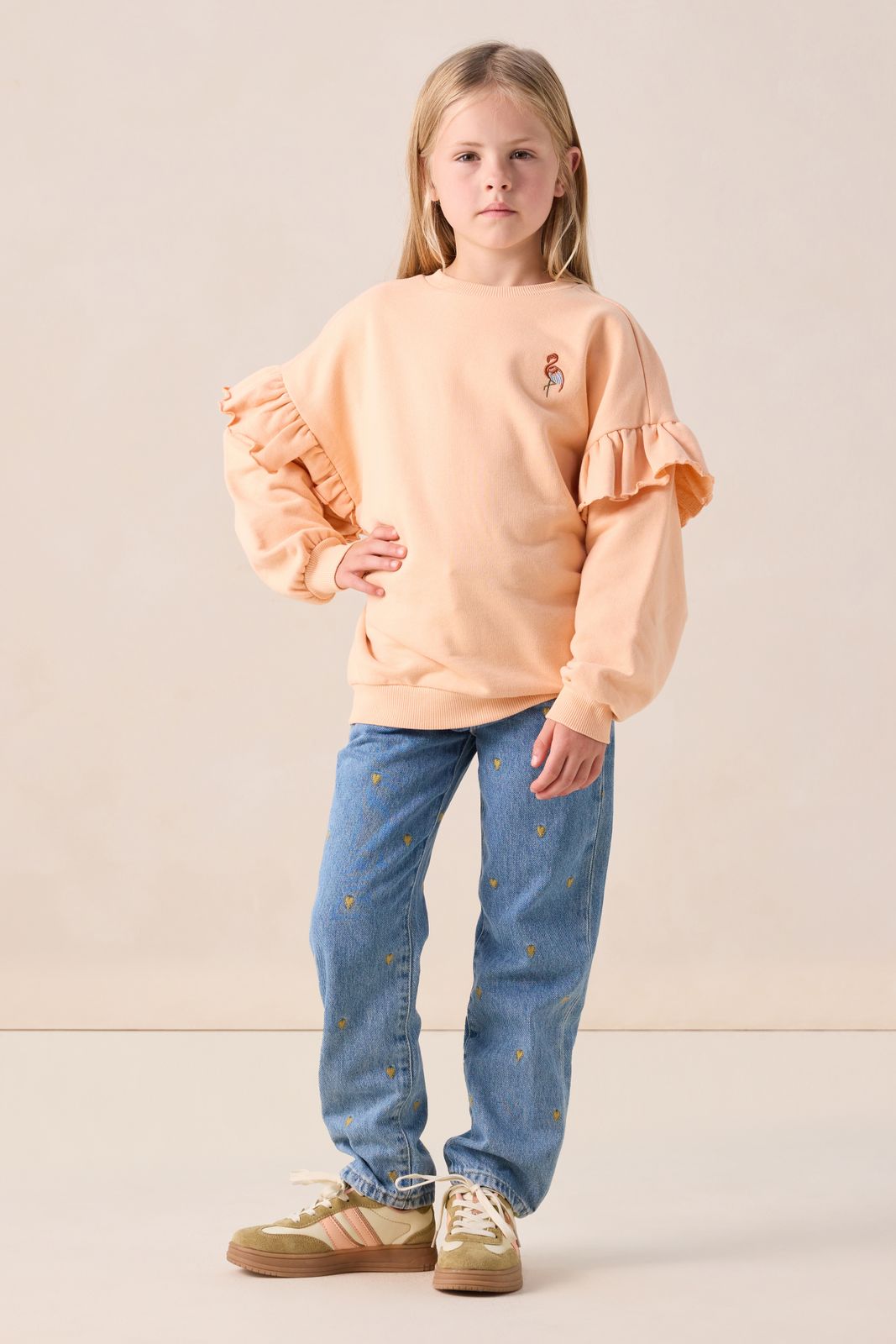 Lichtoranje ruffle sweater