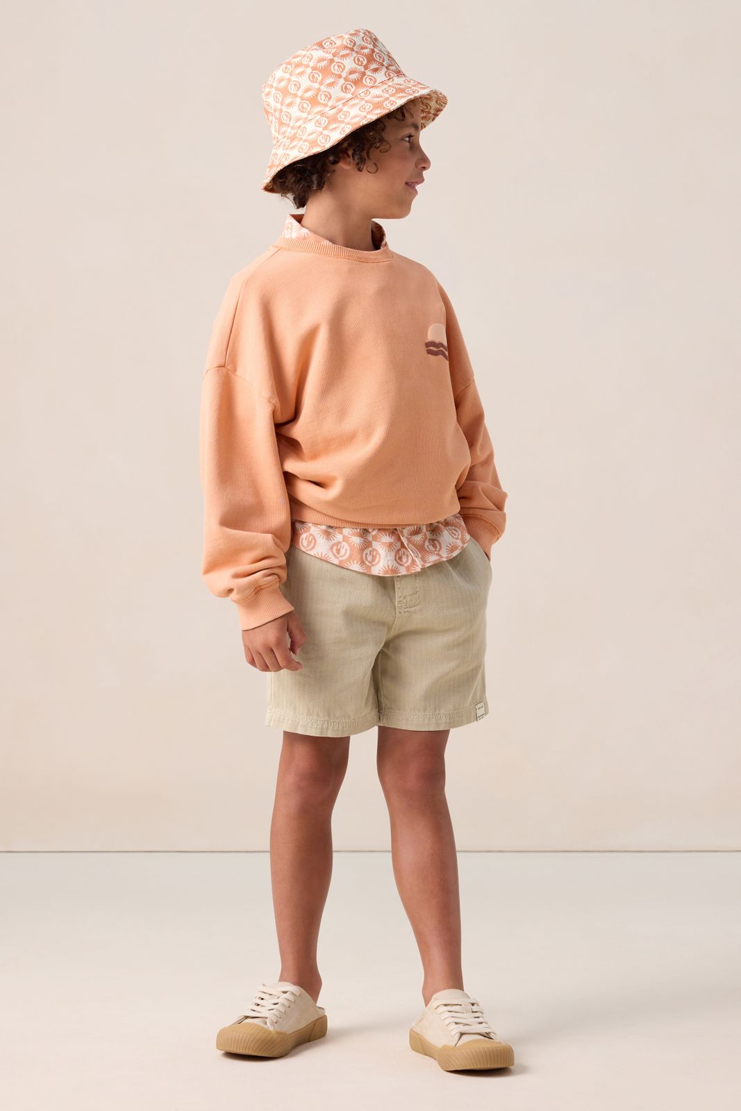 Oranje sweater met artwork