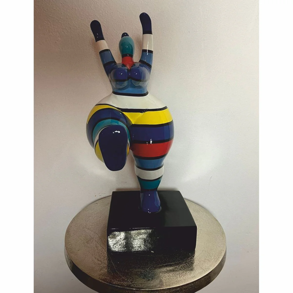 Decorative figure woman doing sports colorful with stripes H. 48 cm - exhibition piece