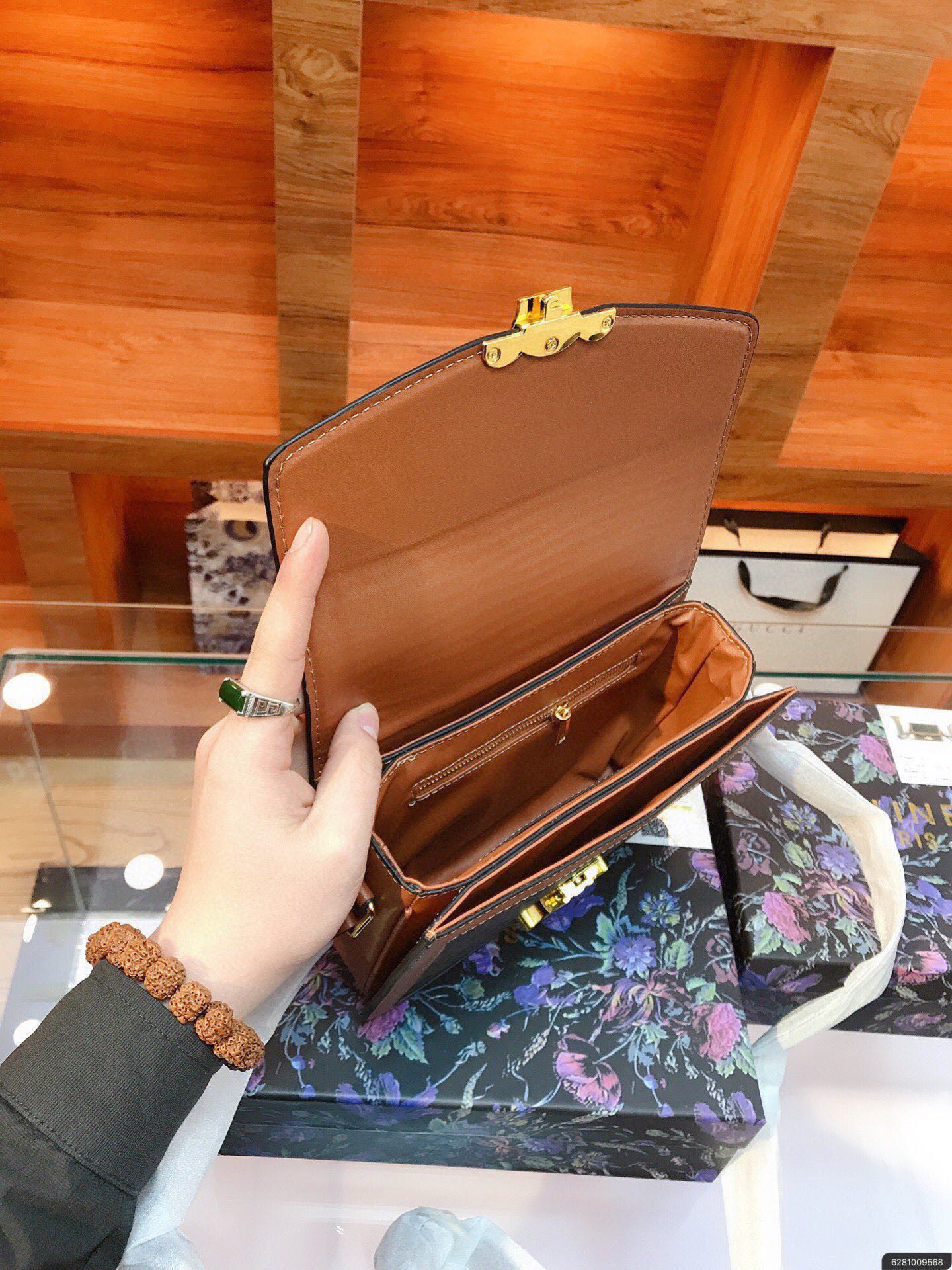CLASSIQUE TRIOMPHE BAG IN TRIOMPHE CANVAS AND CALFSKIN TAN - Top Club