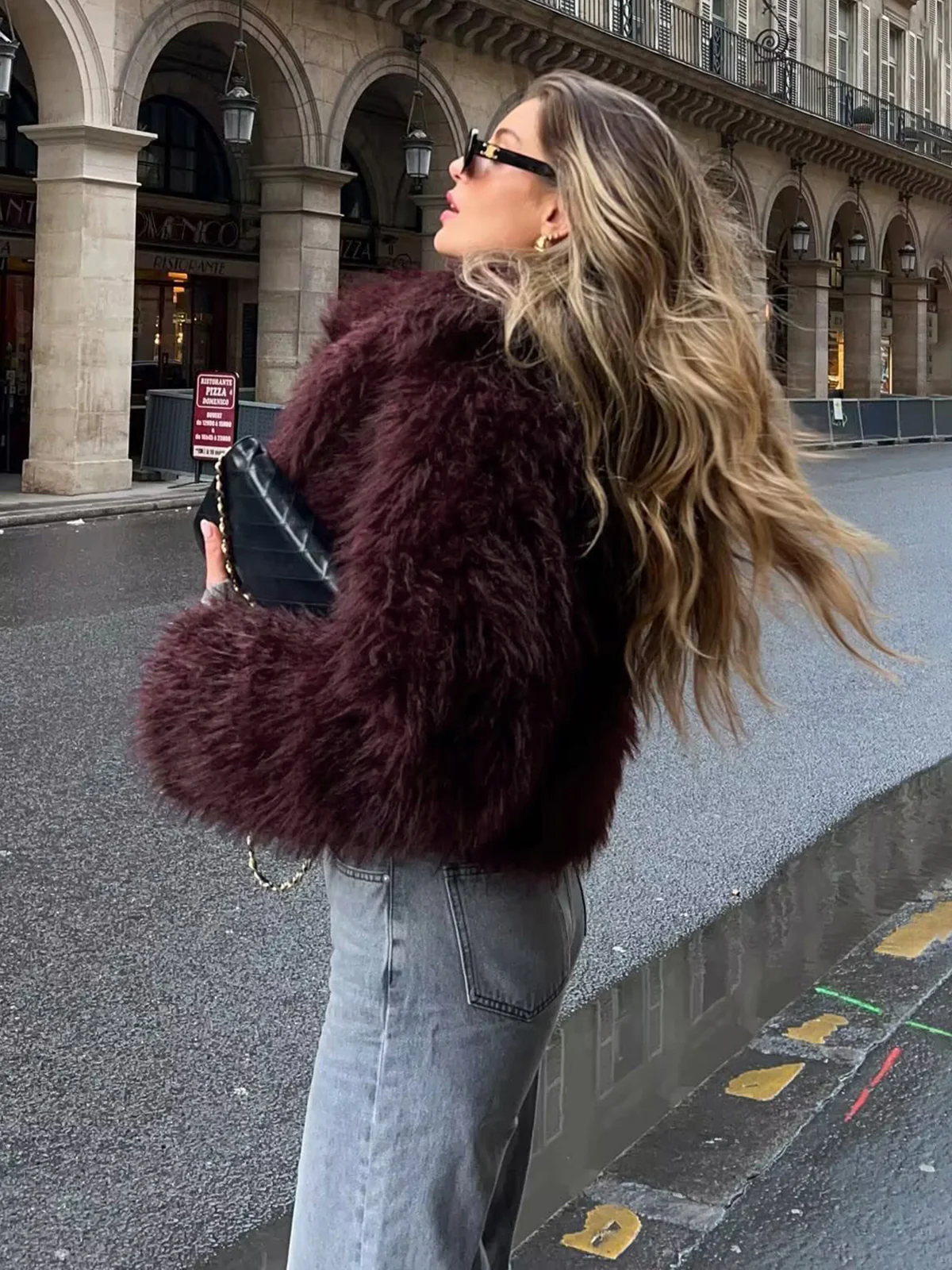 Dark jeans with faux fur jacket party outfit