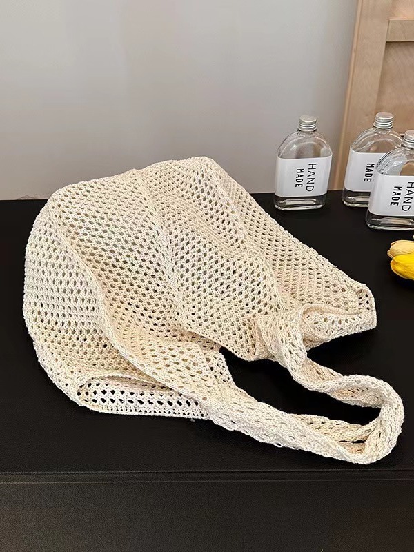 Summer's popular new woven women's handbag, stylish and trendy shoulder mesh bag, straw bag for seaside travel