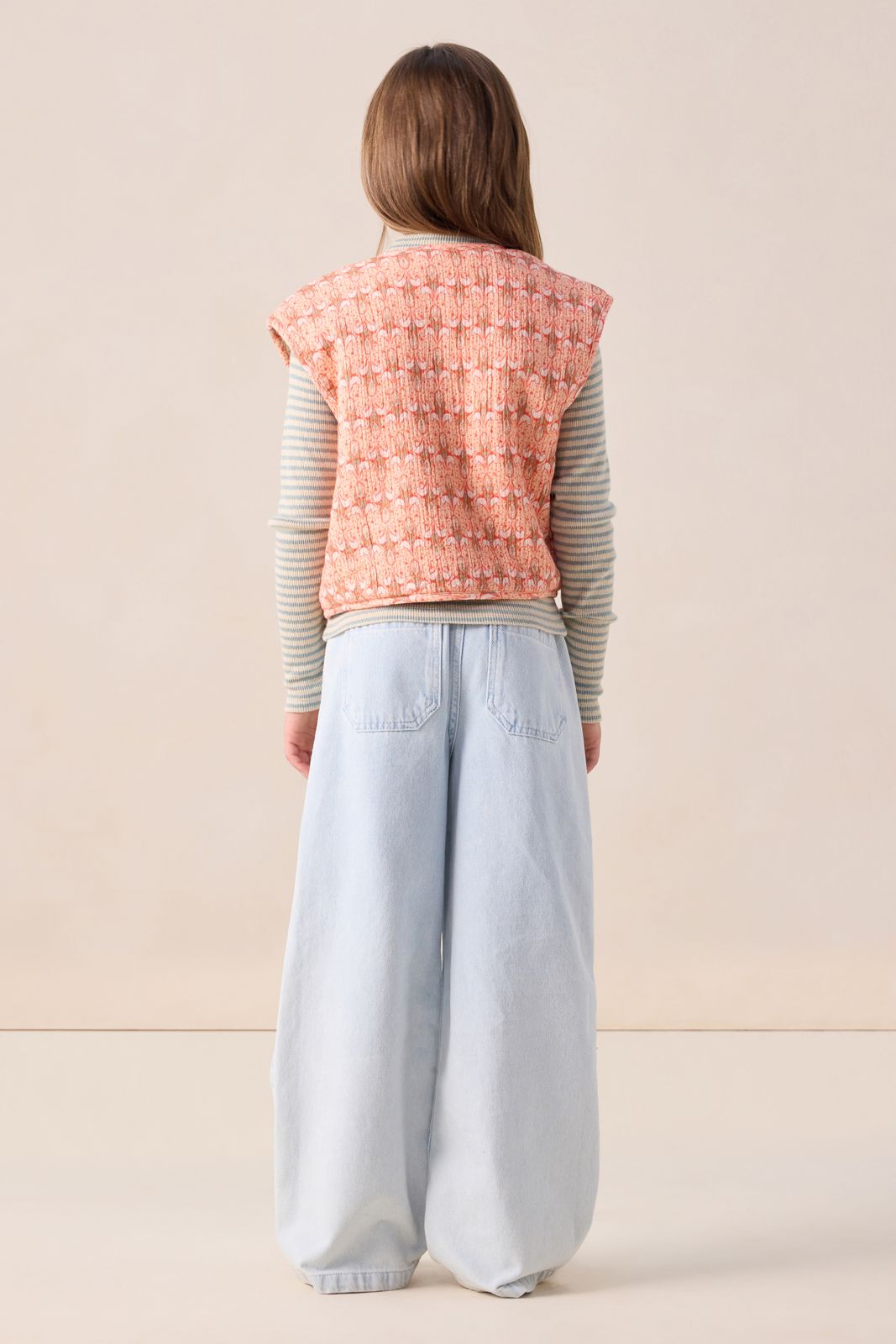 Lichtoranje reversible teddy gilet