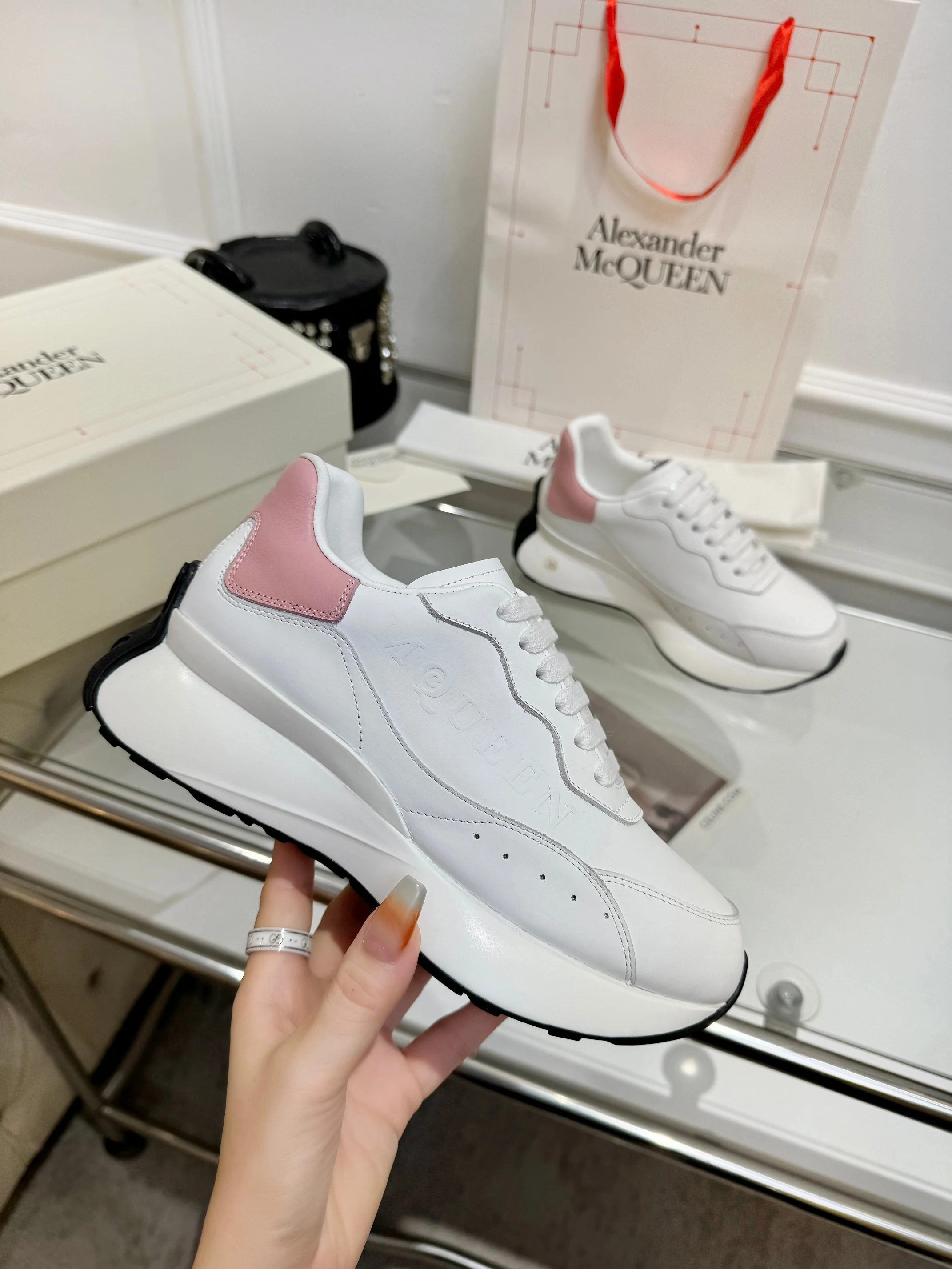 Alexander McQueen Unisex Oversized Sneakers With Metallic Heel Accents - Sneaker Replica Workshop