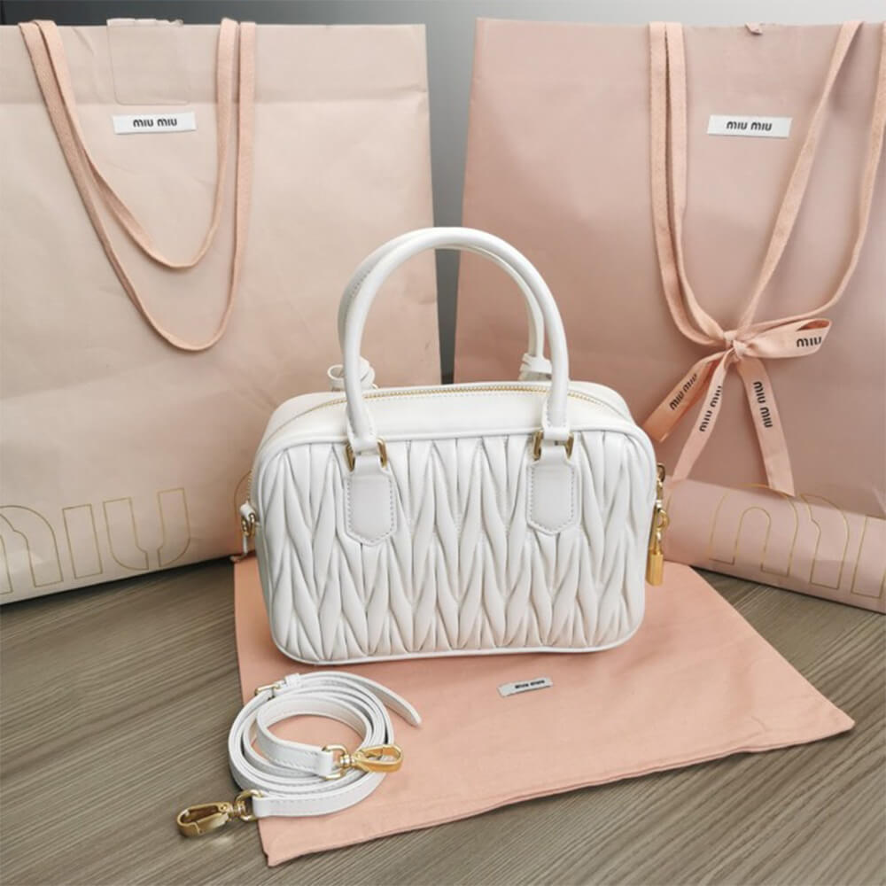 Matelasse nappa leather top-handle bag - Top Club
