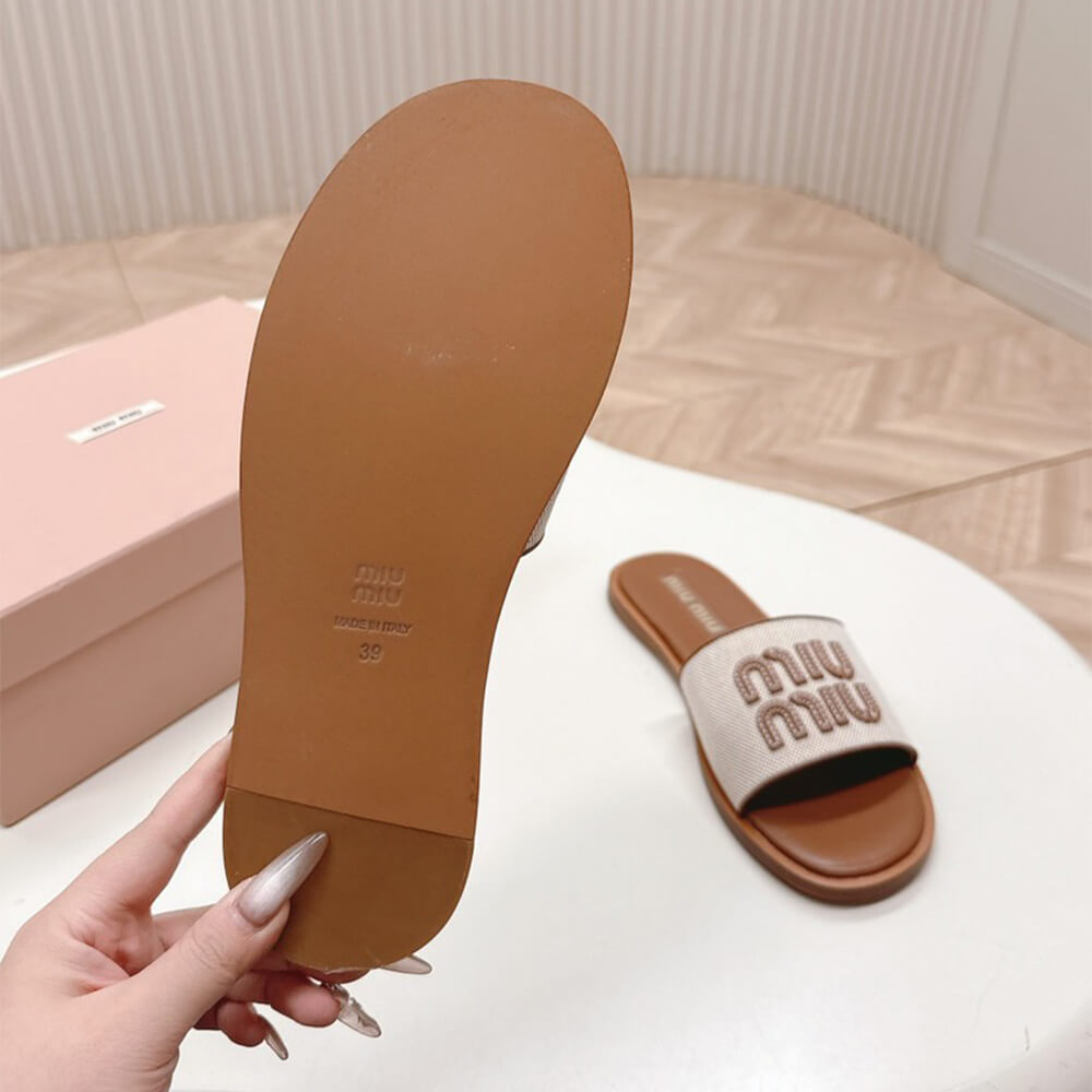 MiuMiu Canvas and leather slides - Top Club