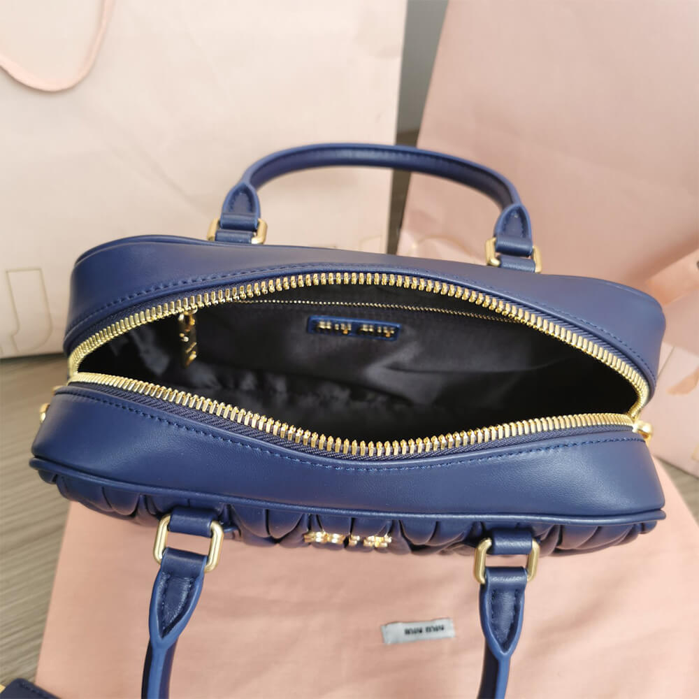 Matelasse nappa leather top-handle bag - Top Club