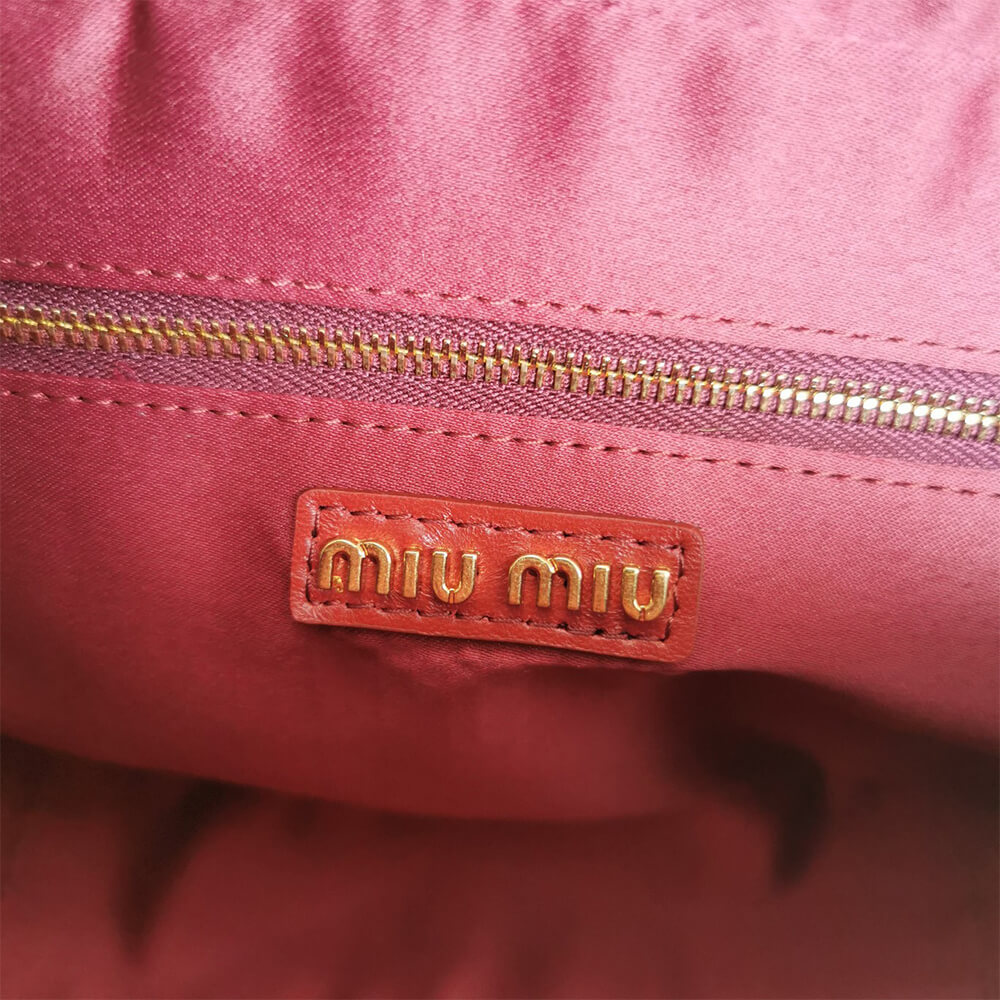 Matelasse nappa leather top-handle bag - Top Club