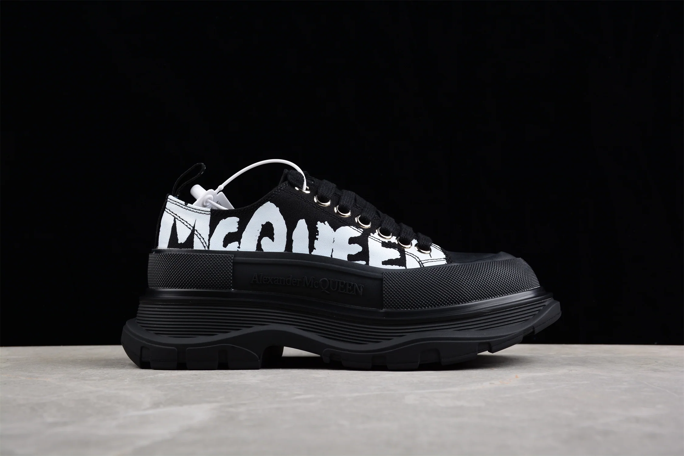 Alexander McQueen Tread Slick Low Lace-Up in Canvas Graffiti Black - Sneaker Replica Workshop