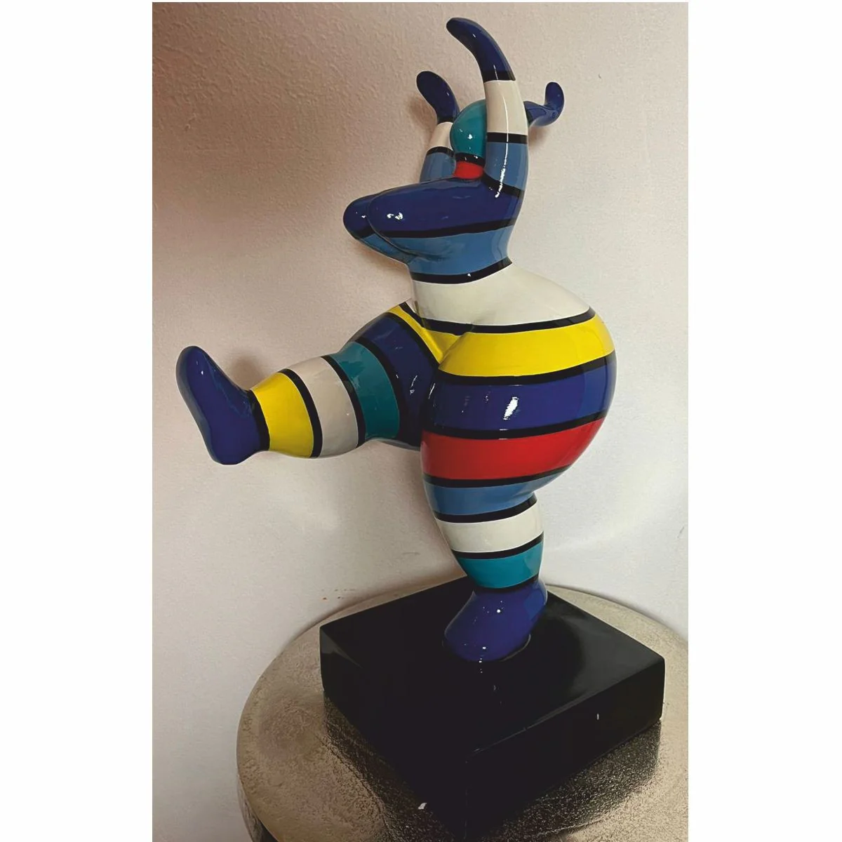 Decorative figure woman doing sports colorful with stripes H. 48 cm - exhibition piece