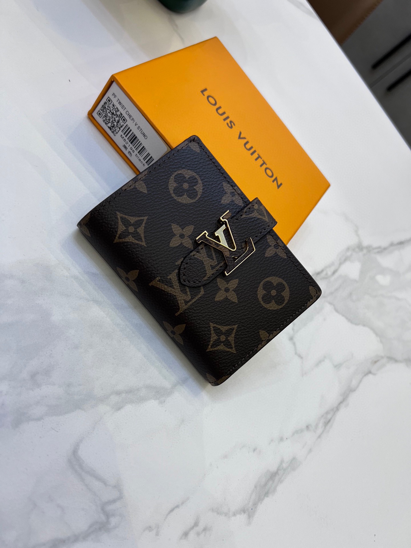 Louis Vertical CP Taurillon leather wallet size : 9*12*10 cm - Top Club