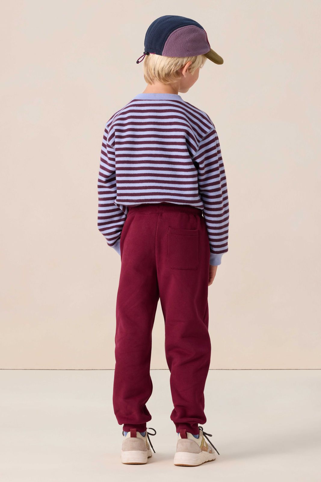 Donkerrode sweatpants met artwork