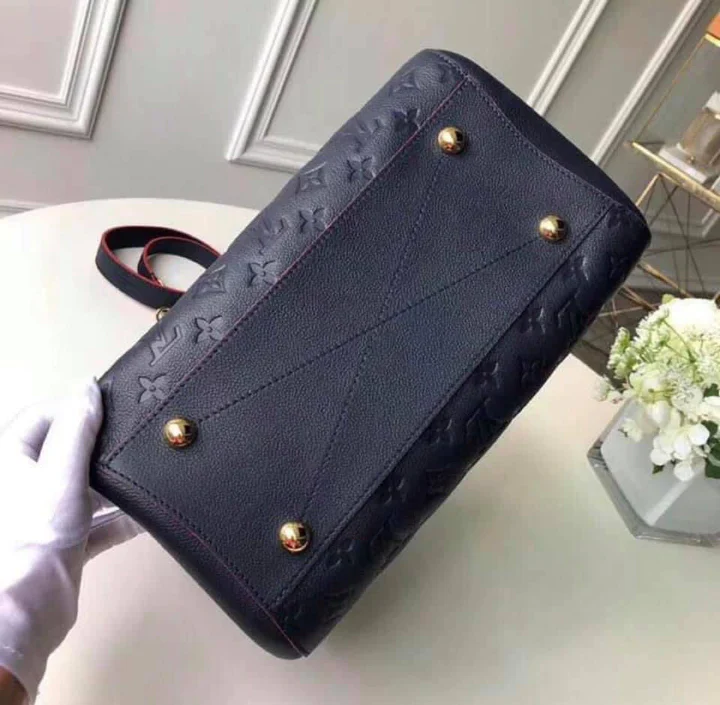 LOUIS VUITTON MONTAIGNE MM BAG - Top Club