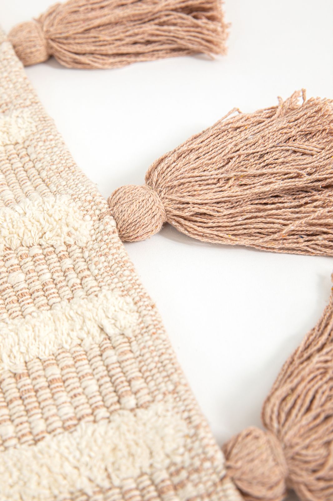 Beige badmat met geometrische figuren